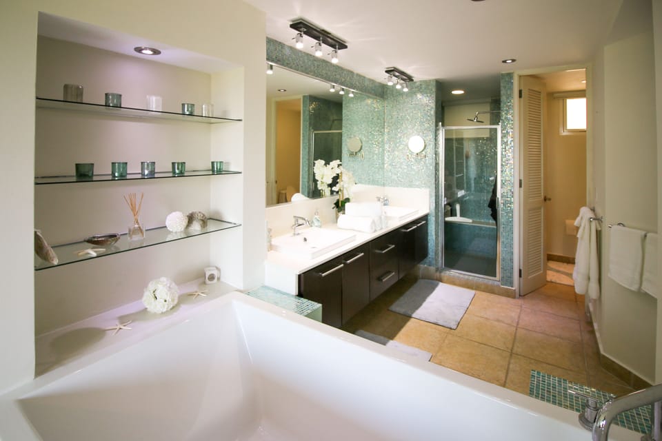 A huge soaking tub is the centerpiece of the spa-like master bathroom.