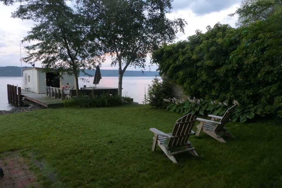 Boathouse, dock, deck and yard....Canvasback Cottage.