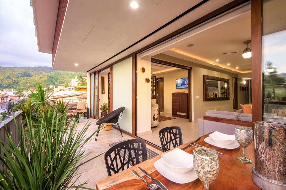 Terrace view into condo and up to the jungle