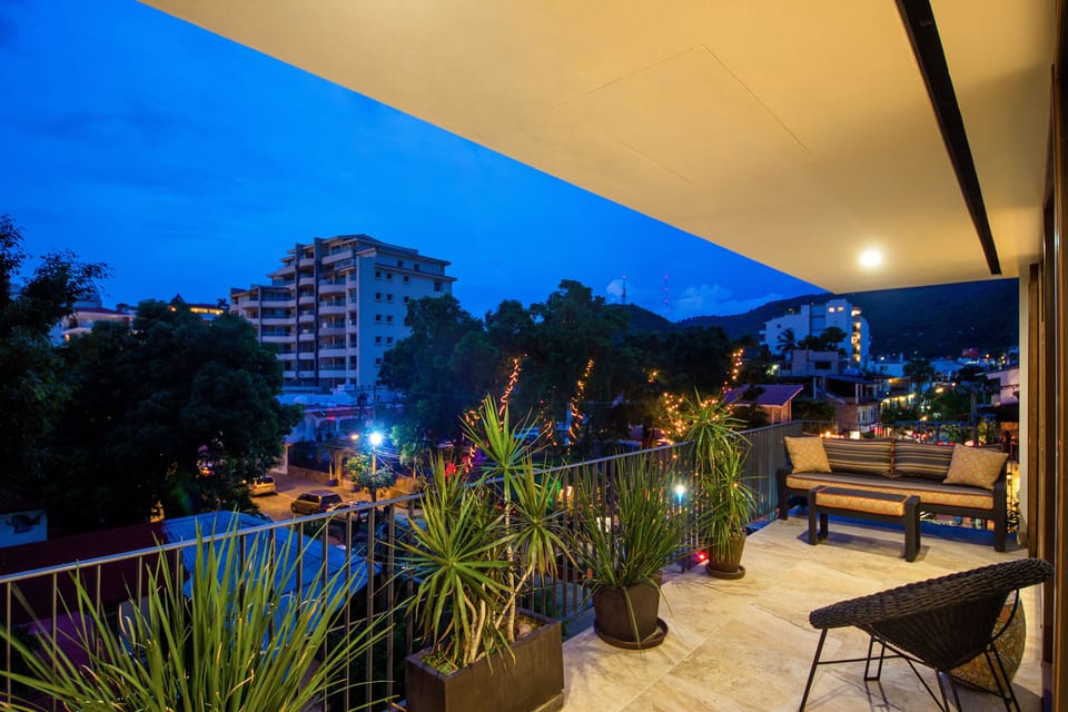Terrace view at dusk of the town square and downtown