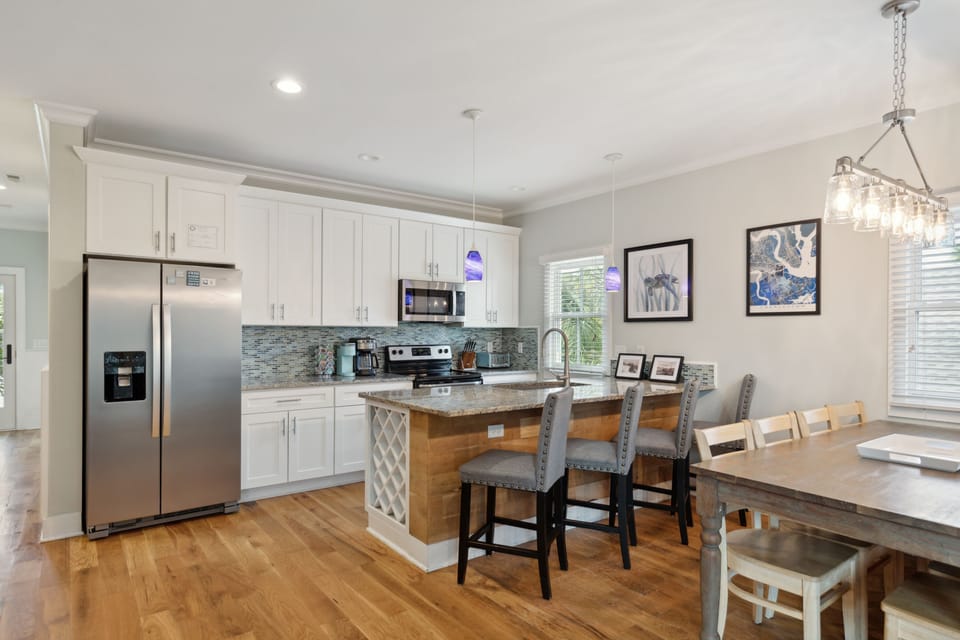 This high-end kitchen with all stainless appliances,  granite countertops, custom wine rack and is equipped with everything you'll need.