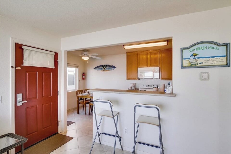 Open floor plan with living room, dining area and kitchen