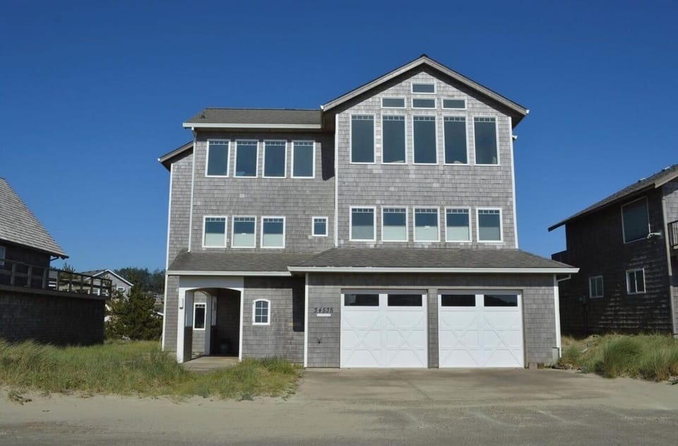 Front of the House. Room for 4 cars to park