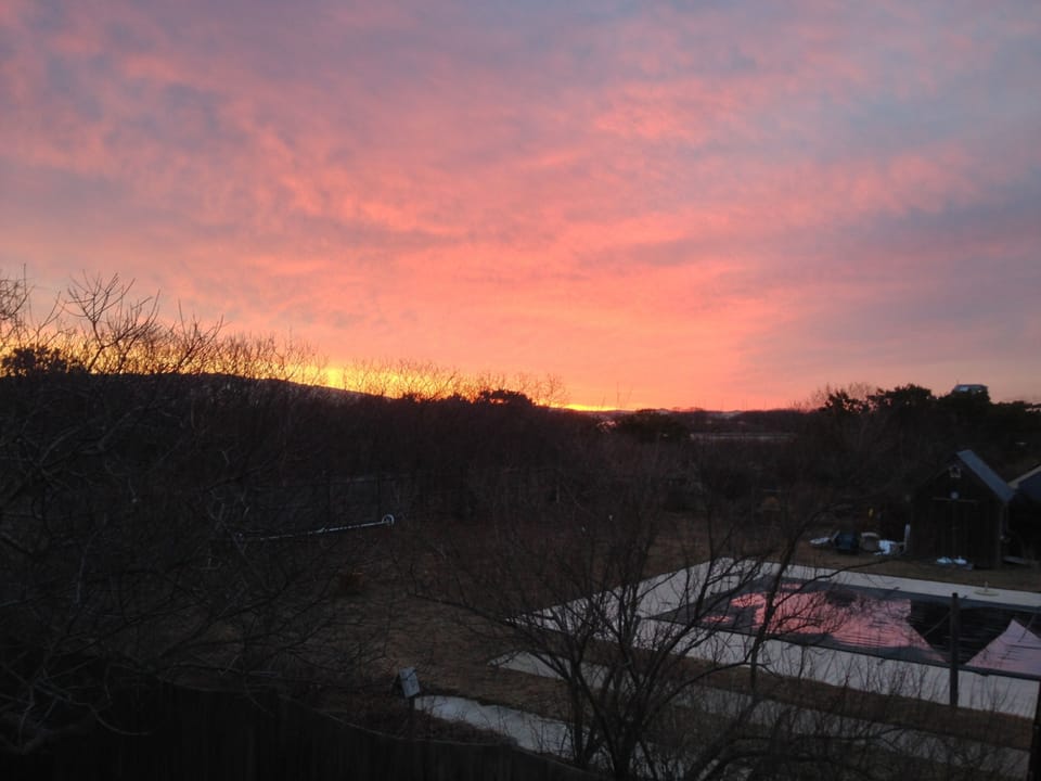 View of sunrise over the dunes from Master bedroom.