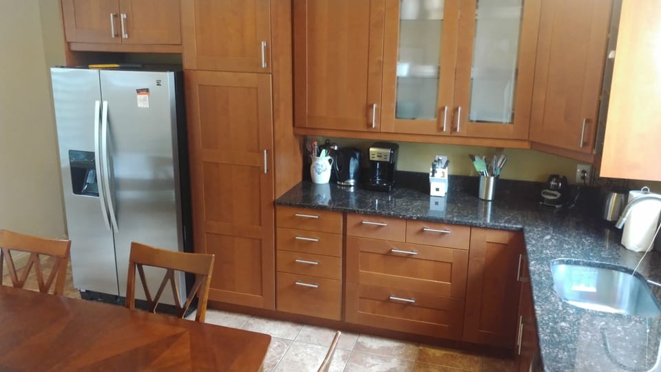 Kitchen with stainless steel appliances.