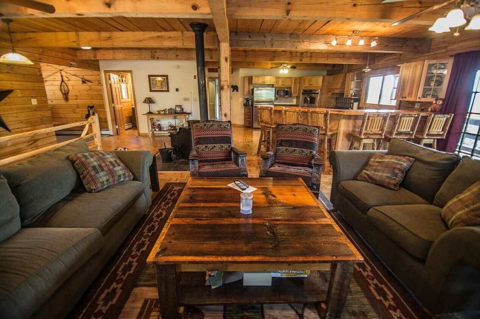 Warm and inviting living space with classic log cabin charm