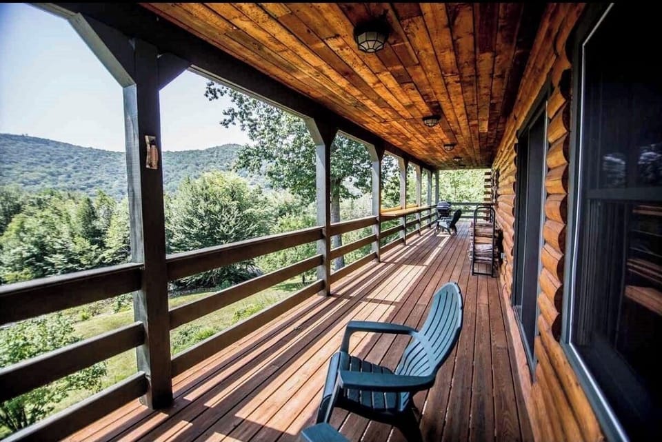 Expansive covered deck with stunning mountain views