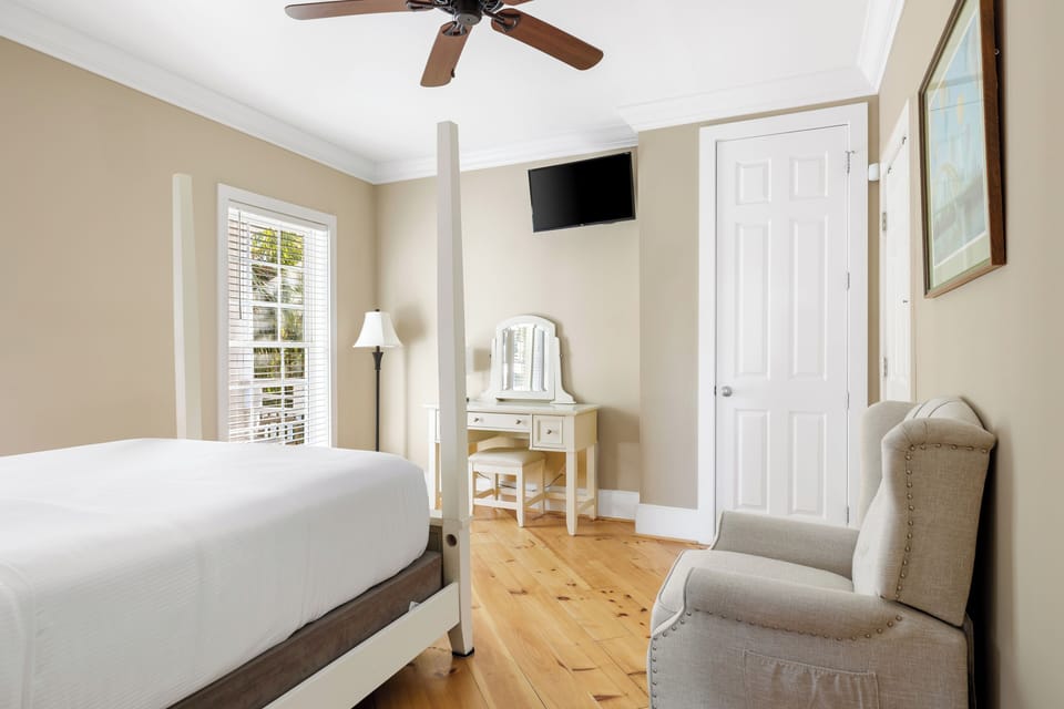 Cozy and comfortable! This first floor queen-sized bedroom offers a peaceful retreat, with easy access to a spacious shared bathroom for your convenience.