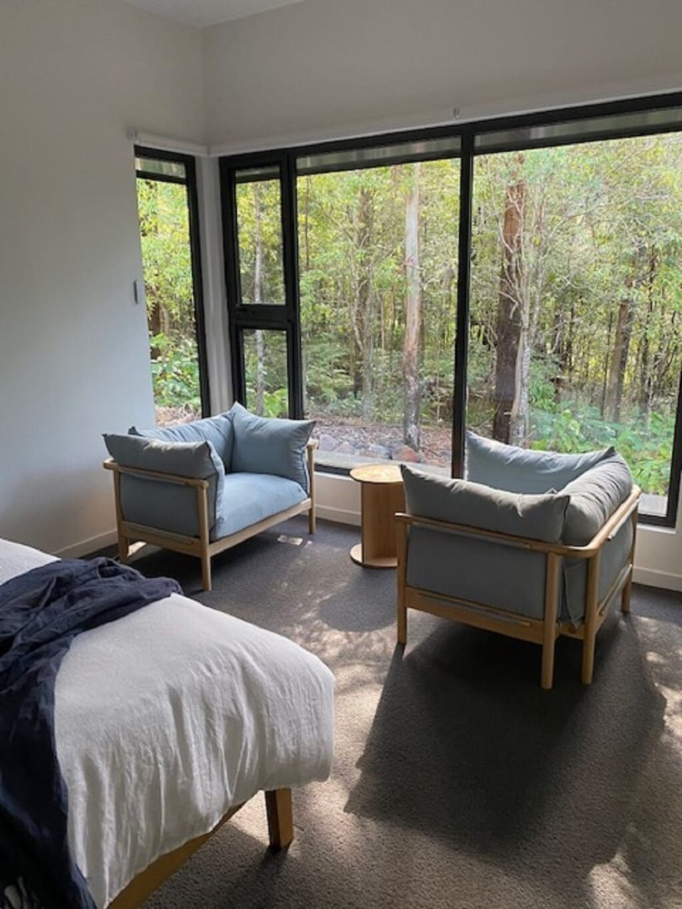 Bedroom 4 with sitting area with bush views