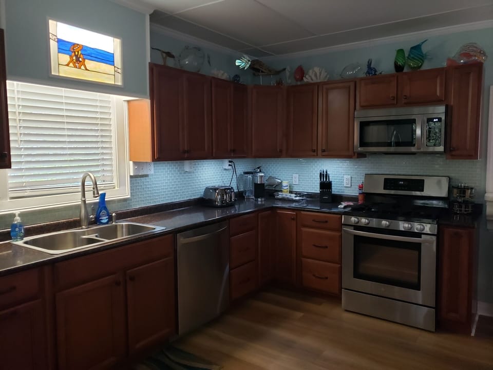 Large kitchen with everything you will need to prepare a  Meal or Enjoy Takeout!