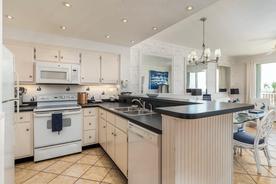 Your fully equipped kitchen features modern appliances and spacious countertops, perfect for preparing meals during your stay.