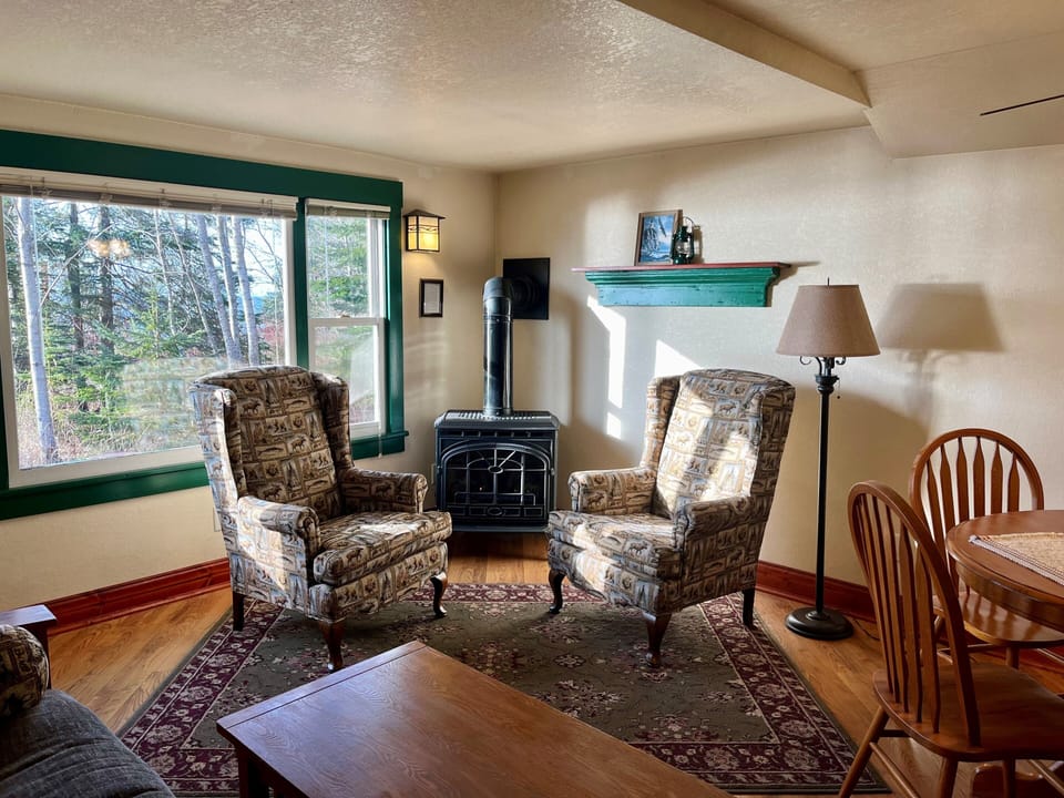 Decorative Gas Stove
Sit back in our two wingback chairs while warming yourself beside the decorative gas stove. Get lost in the flames from the stove and the warm light they cast in the living area of Cottage #3.