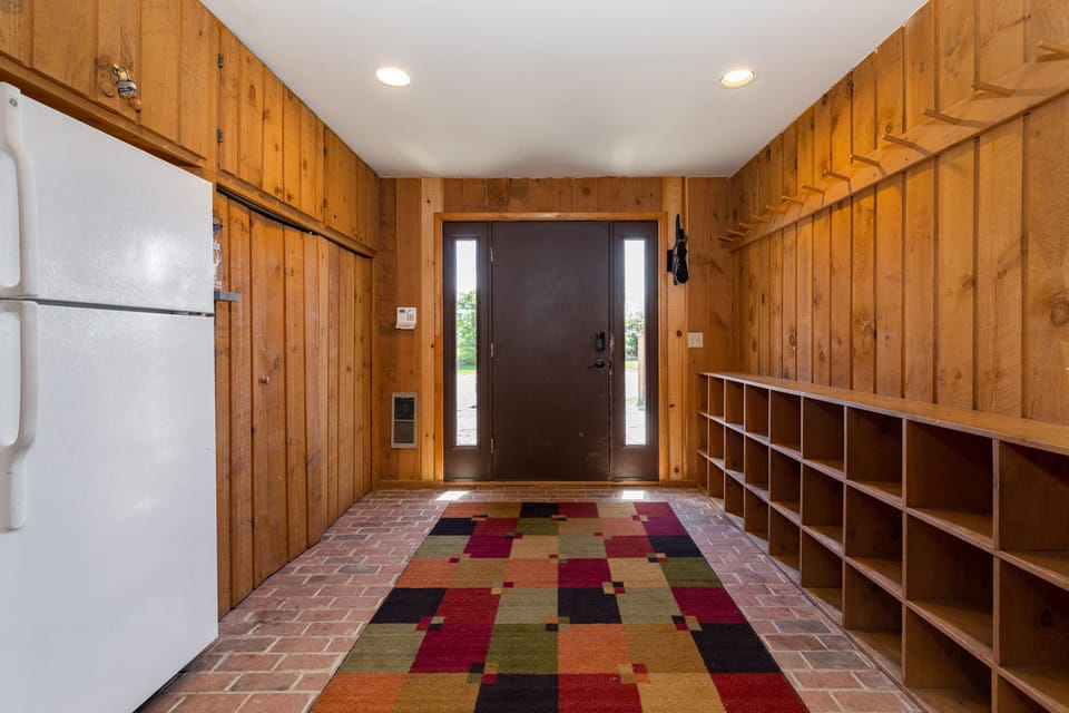 Mudroom | 1st Floor | Coats, Boots, Refrigerator