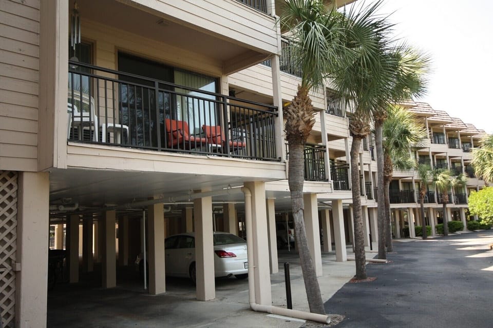 Looking up to our balcony over the covered parking area.