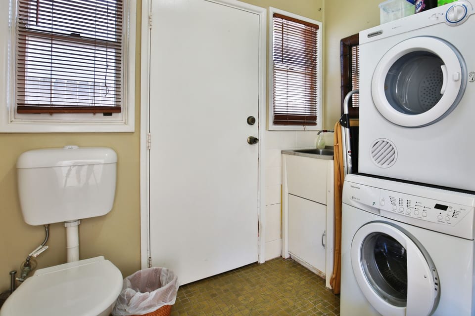 laundry and extra toilet
