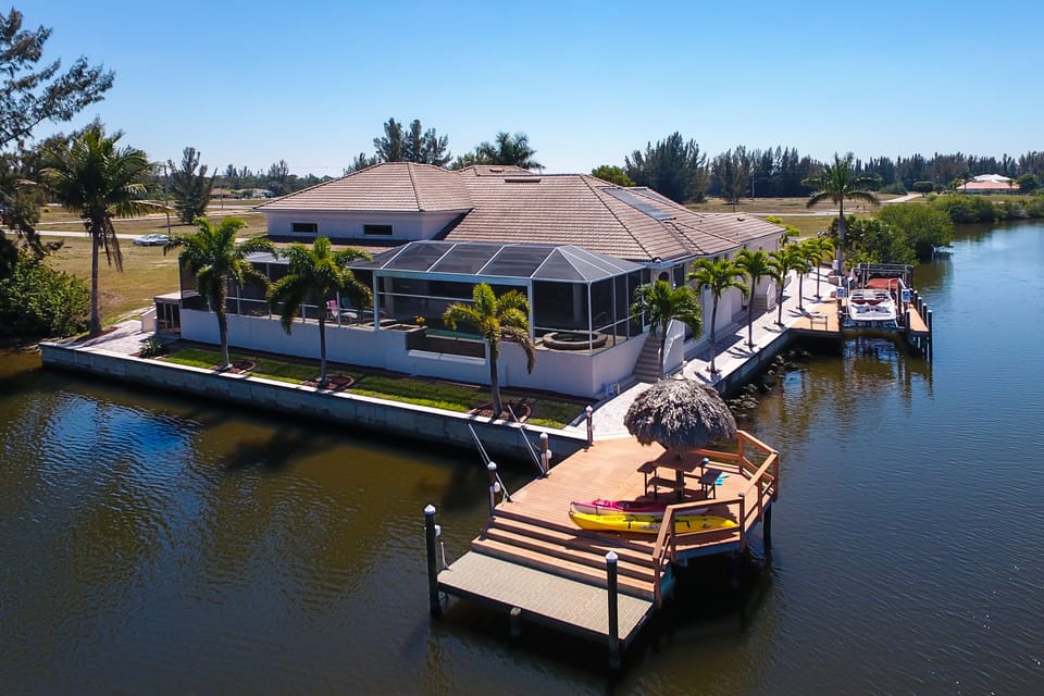Enjoy hanging out on the dock under the tiki hut
