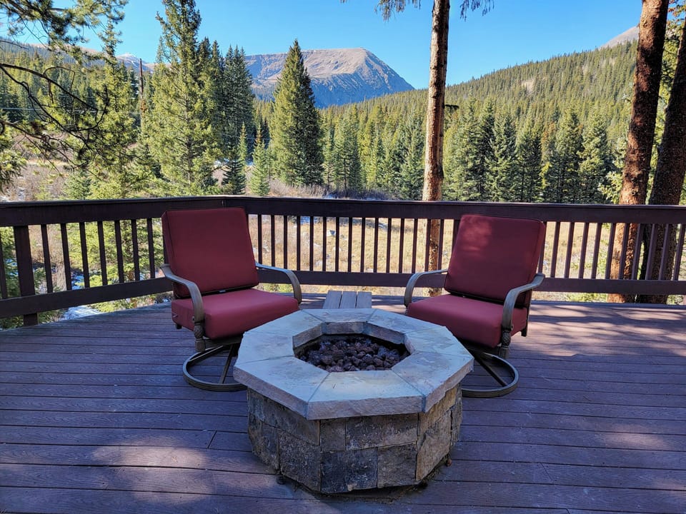 gas fire pit on large outdoor deck