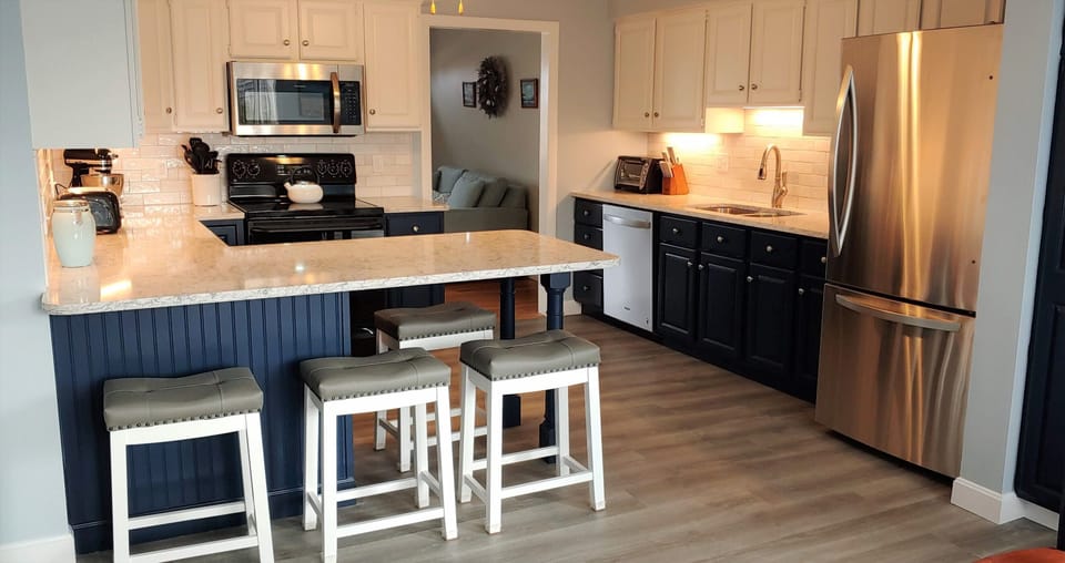 Gorgeous remodeled kitchen w/all new stainless appliances, huge island
