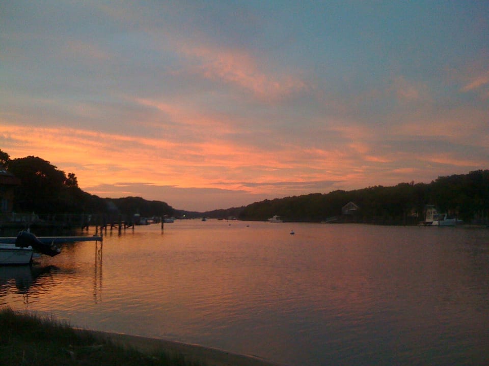 Sunset at small beach near the house.