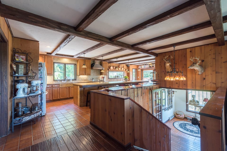 6B induction cooktop / Wolf oven  / 16' prep island / kitchen adjacent to deck