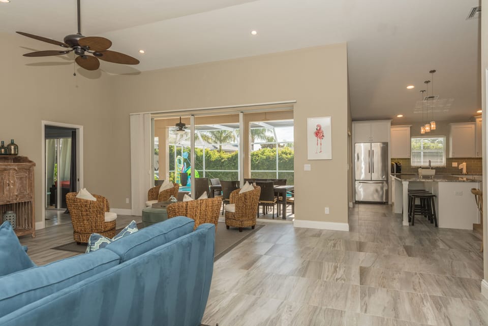 Lanai doors can be opened completely to join both areas