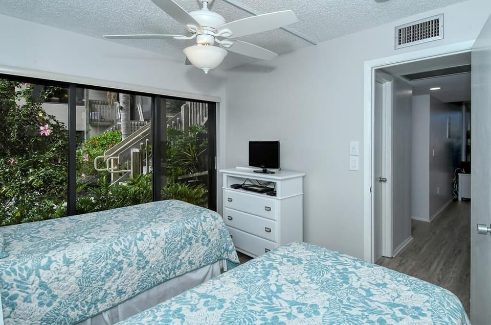 Guest bedroom with small tv 