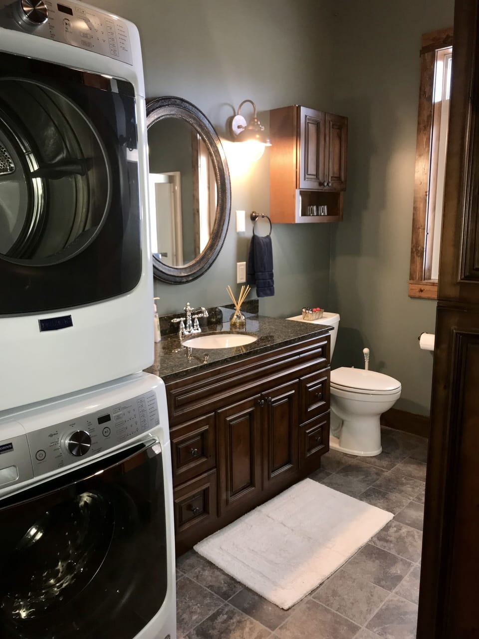 Full bathroom and laundry room between bedrooms one and two
