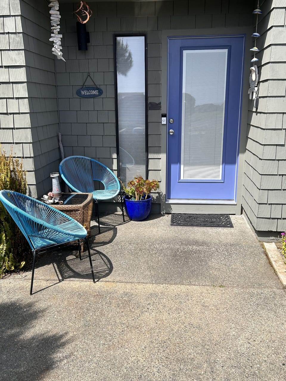 Front entry .Classic shingled beach bungalow . 
