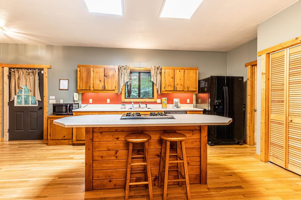 Open, Light, and Well Appointed Kitchen offers a Gas Range