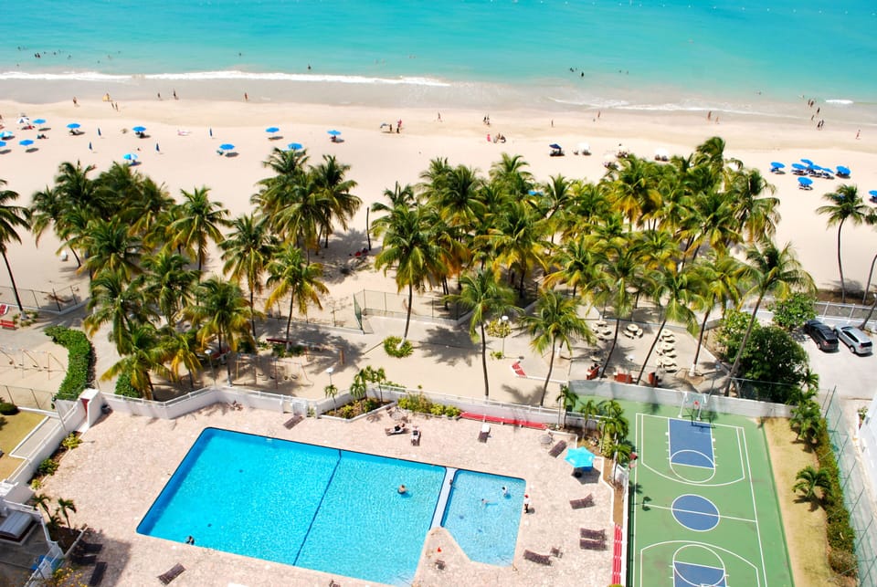 Our pool and basketball court,
by the beach