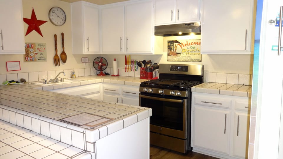 Kitchen-2nd floor-new gas range with convection feature.