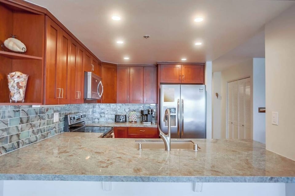 Kitchen fully equipped for meals at home! Stainless steel appliances including a dishwasher