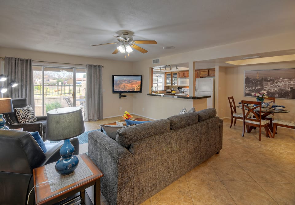 Sliding doors exit to the patio and offer exciting views of greenbelt spaces with possible wildlife sightings.