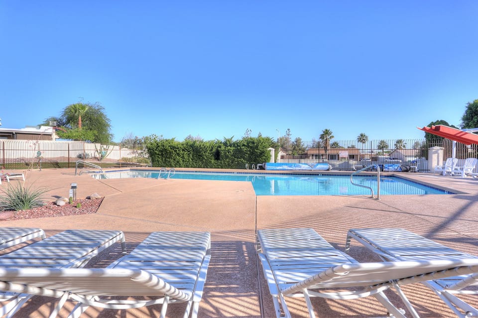 Community pool with spa is heated and ready for refreshing dips year round.