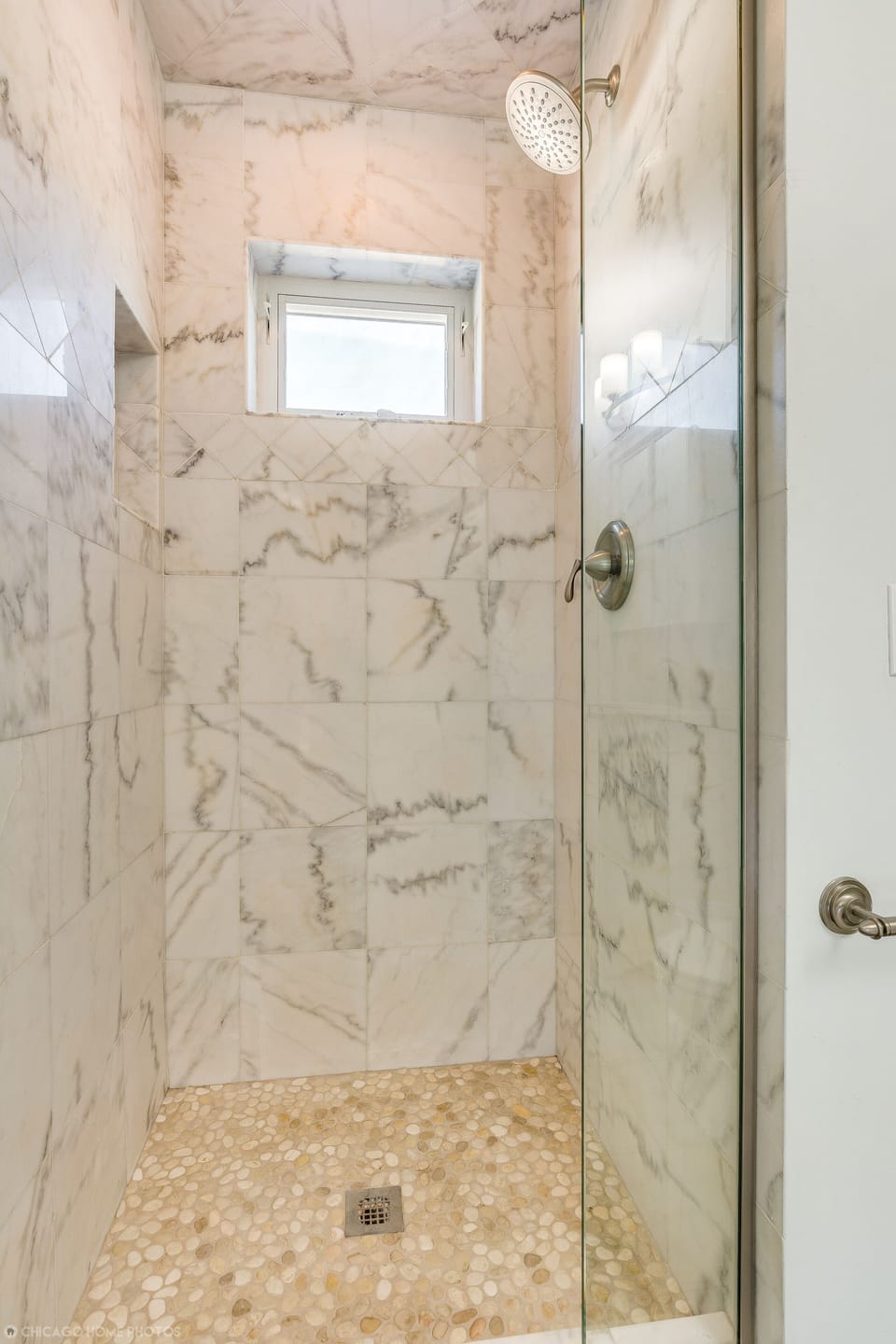 Pamper yourself in Spa Like Bathrooms with beautiful tile and glass shower doors