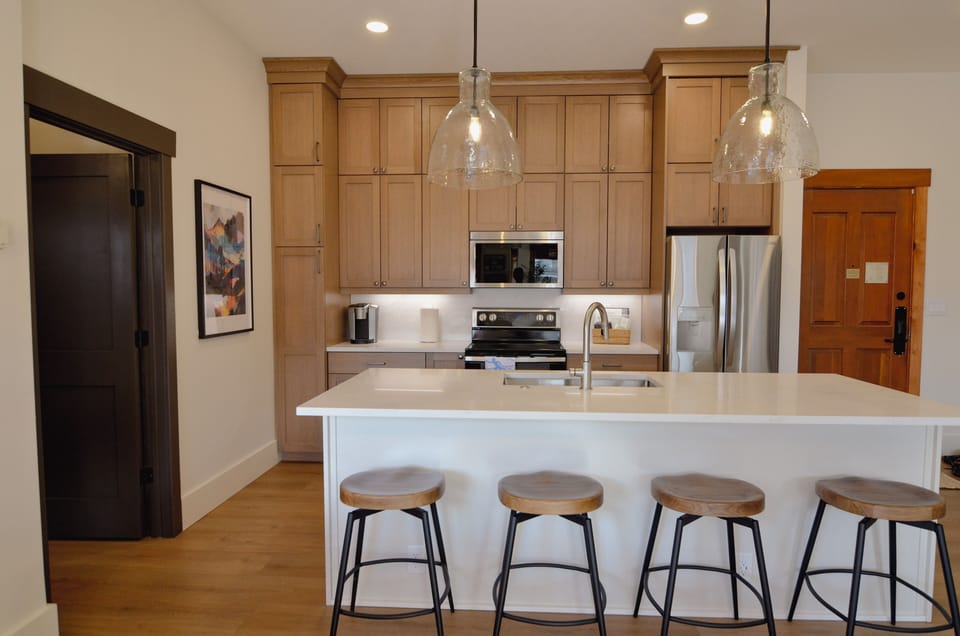 Fully remodeled kitchen with modern appliances, 8+ ft island and new cabinets