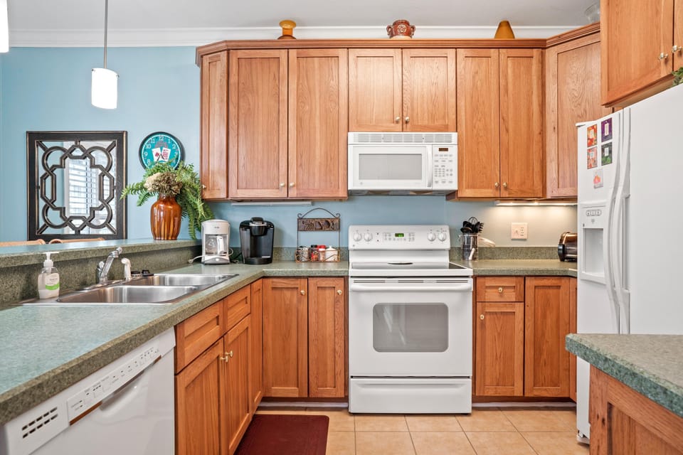 full kitchen with bar seating