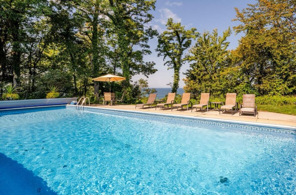 Private heated in-ground pool with shallow and deep end