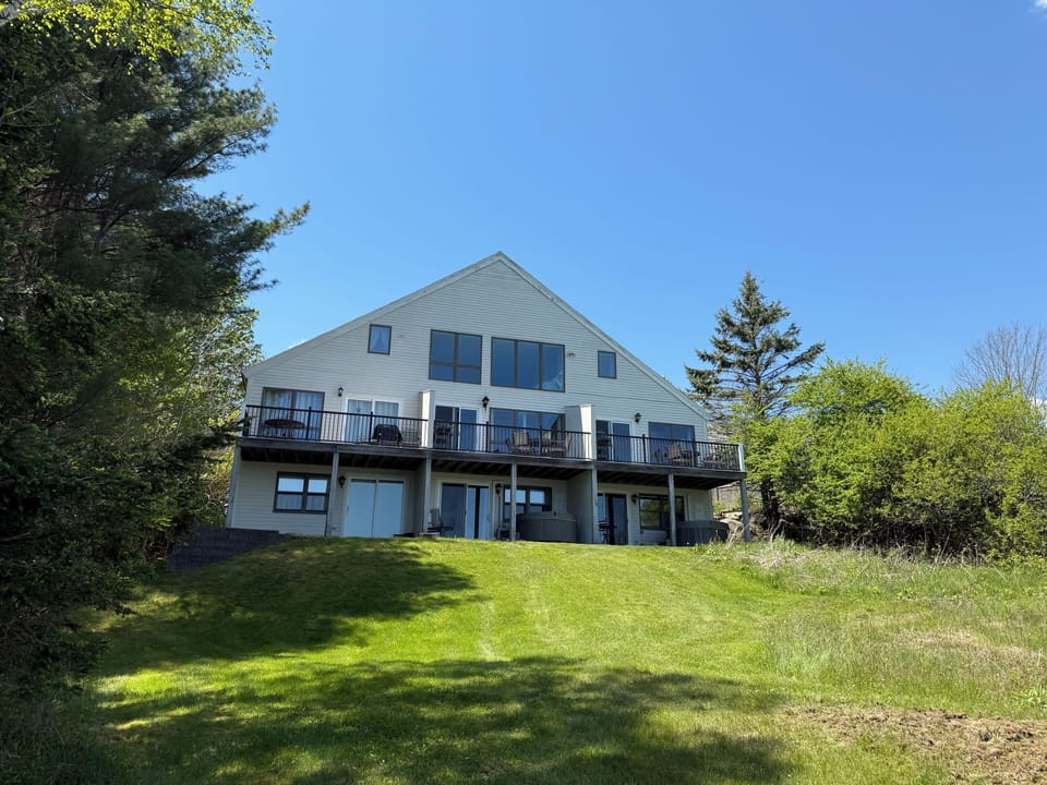 View of front of condo facing ocean, Midships is the middle unit