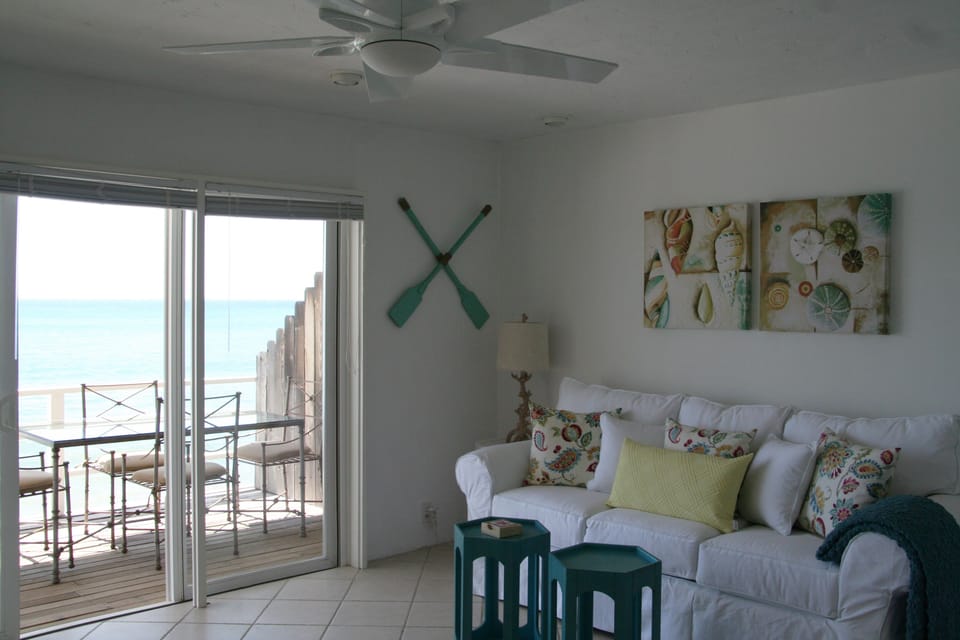 Oceanfront living room with panoramic ocean views
