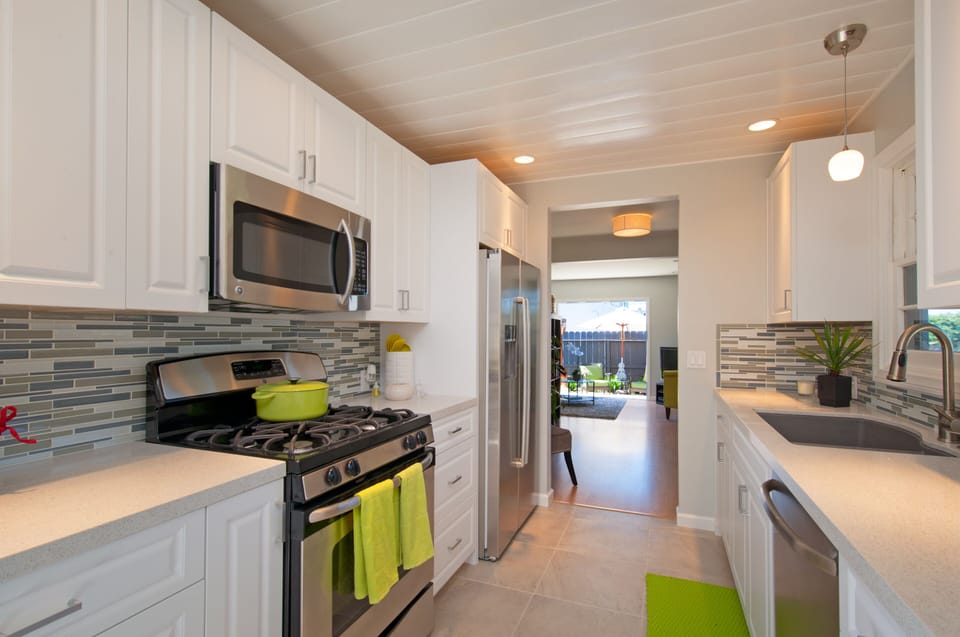 Fully stocked kitchen with GE and Bosch appliances.  Washer & Dryer