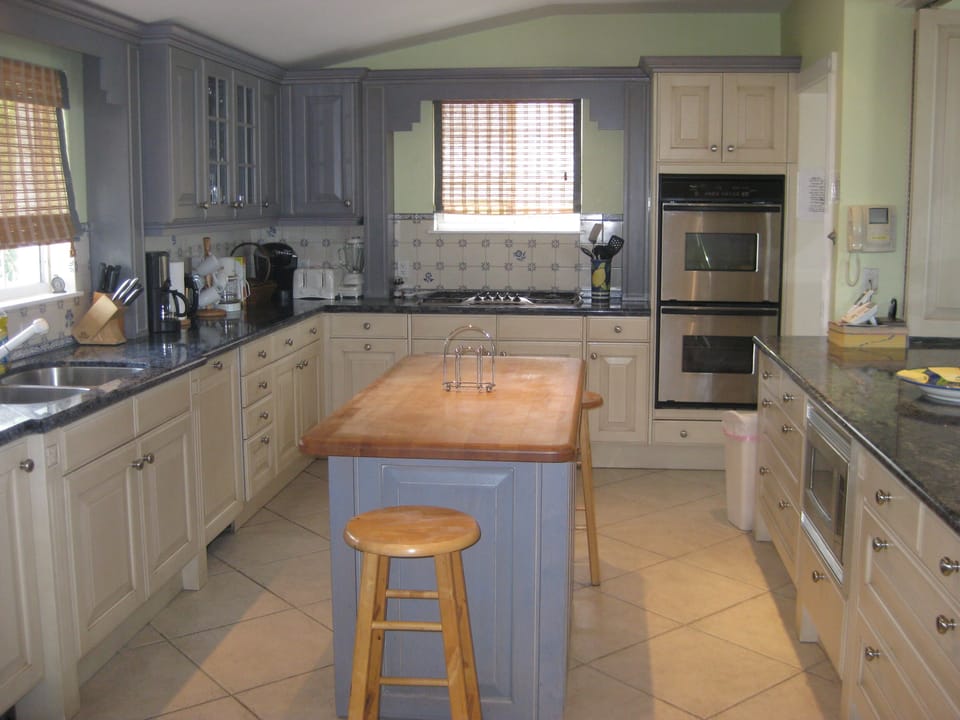 Fully equipped kitchen with granite countertops