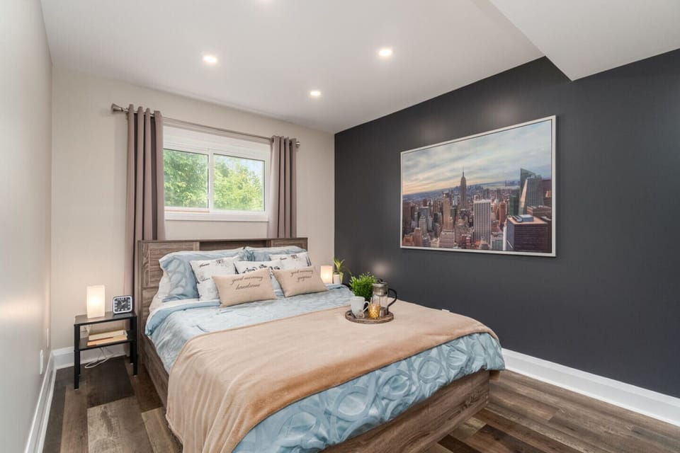 Third bedroom with comfortable queen bed and blackout curtains.  

*This room is only used if guests are booking greater than 5 guests.  If guests 4 or less would like to use room, an additional $25 charge can be applied to the room rate.