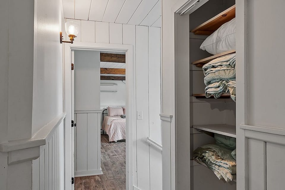 linen closet in upstairs hallway