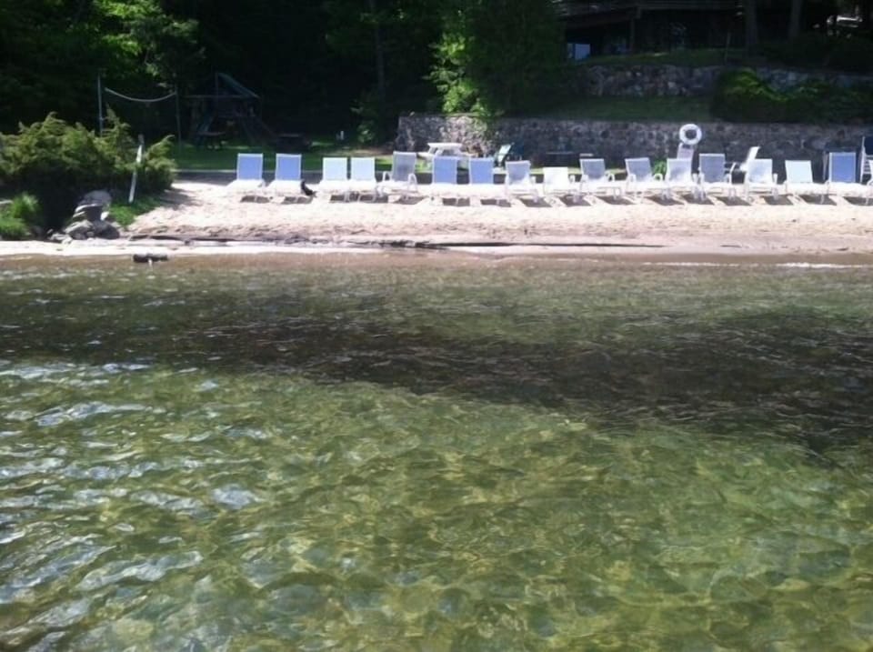 Association beach. There is a float and plenty of chairs. Also, swing area/kids.