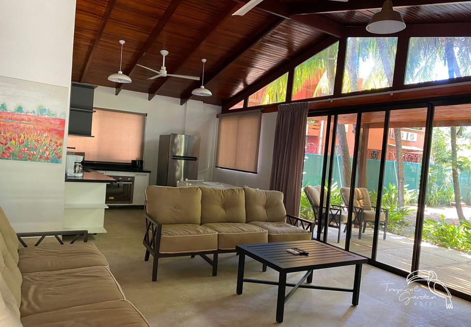Classic House, Multiple Beds, Non Smoking, Pool View | Living area | 30-inch flat-screen TV with cable channels, TV