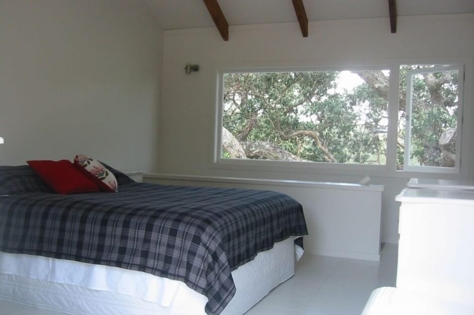 Bedroom - picture window to sea