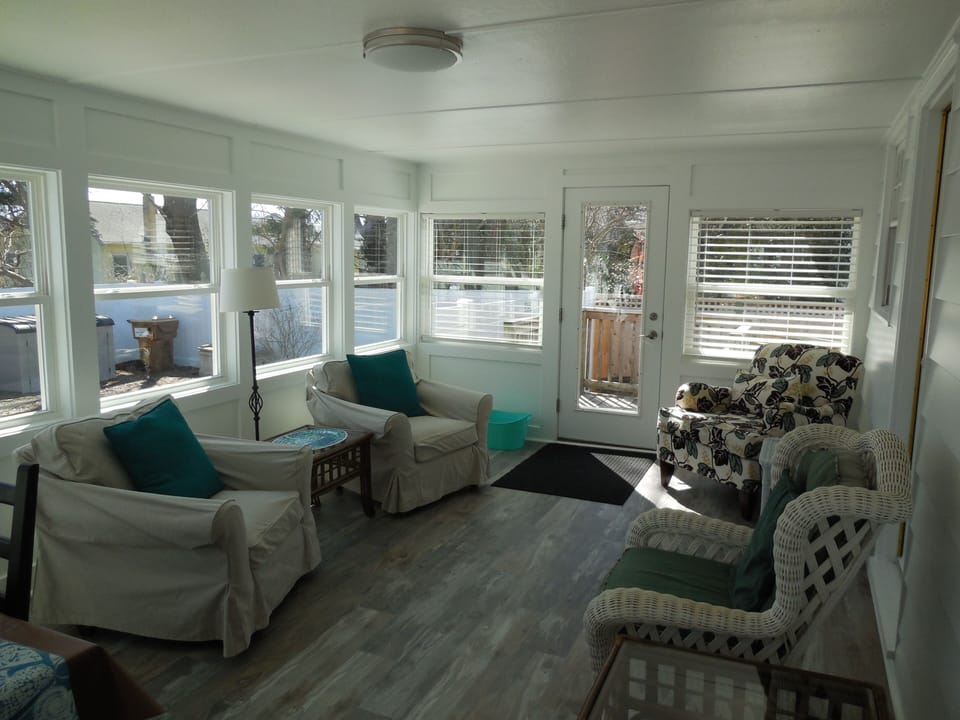 Screened Porch Overlooking the Pool.