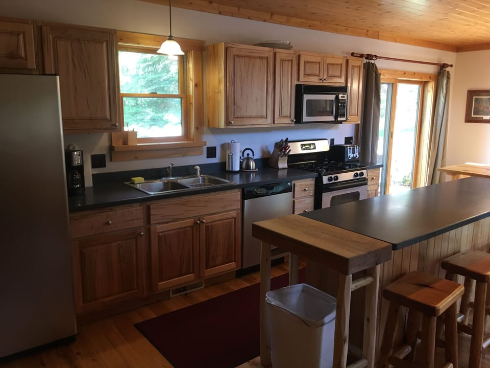 Chef's kitchen with stainless appliances, island for entertaining, etc.