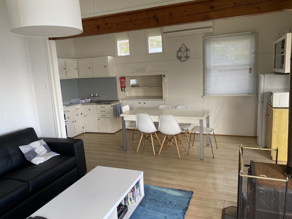 Lounge and dining area.  Kitchen in background has been upgraded.  
